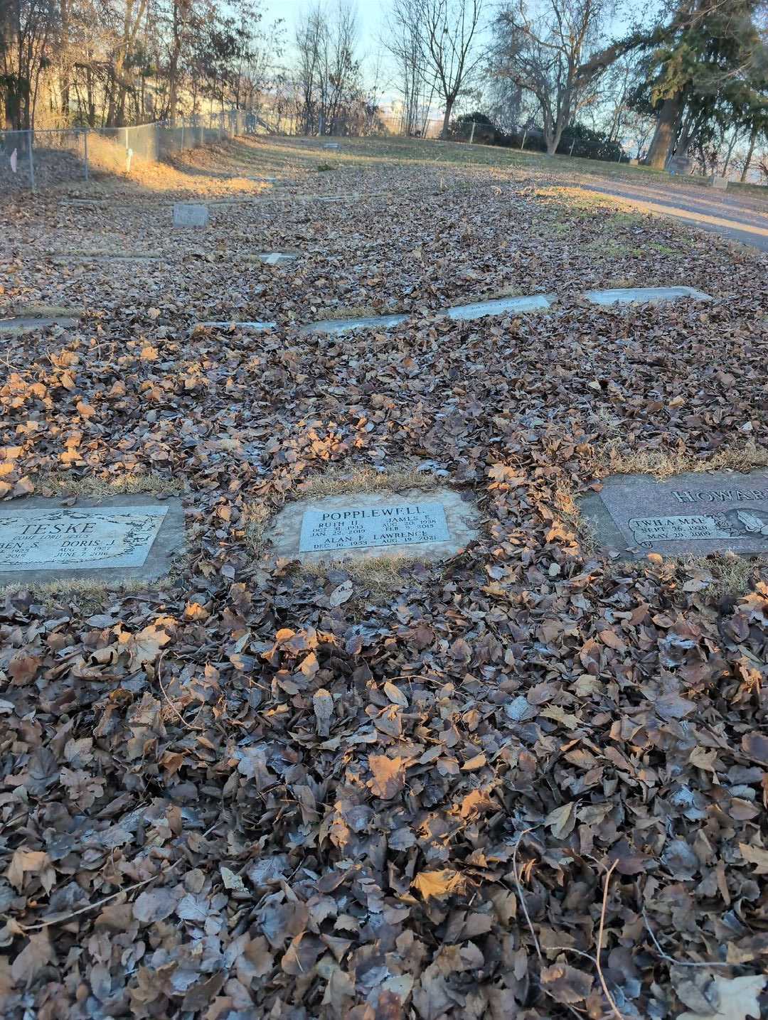 James E. Popplewell's grave. Photo 2